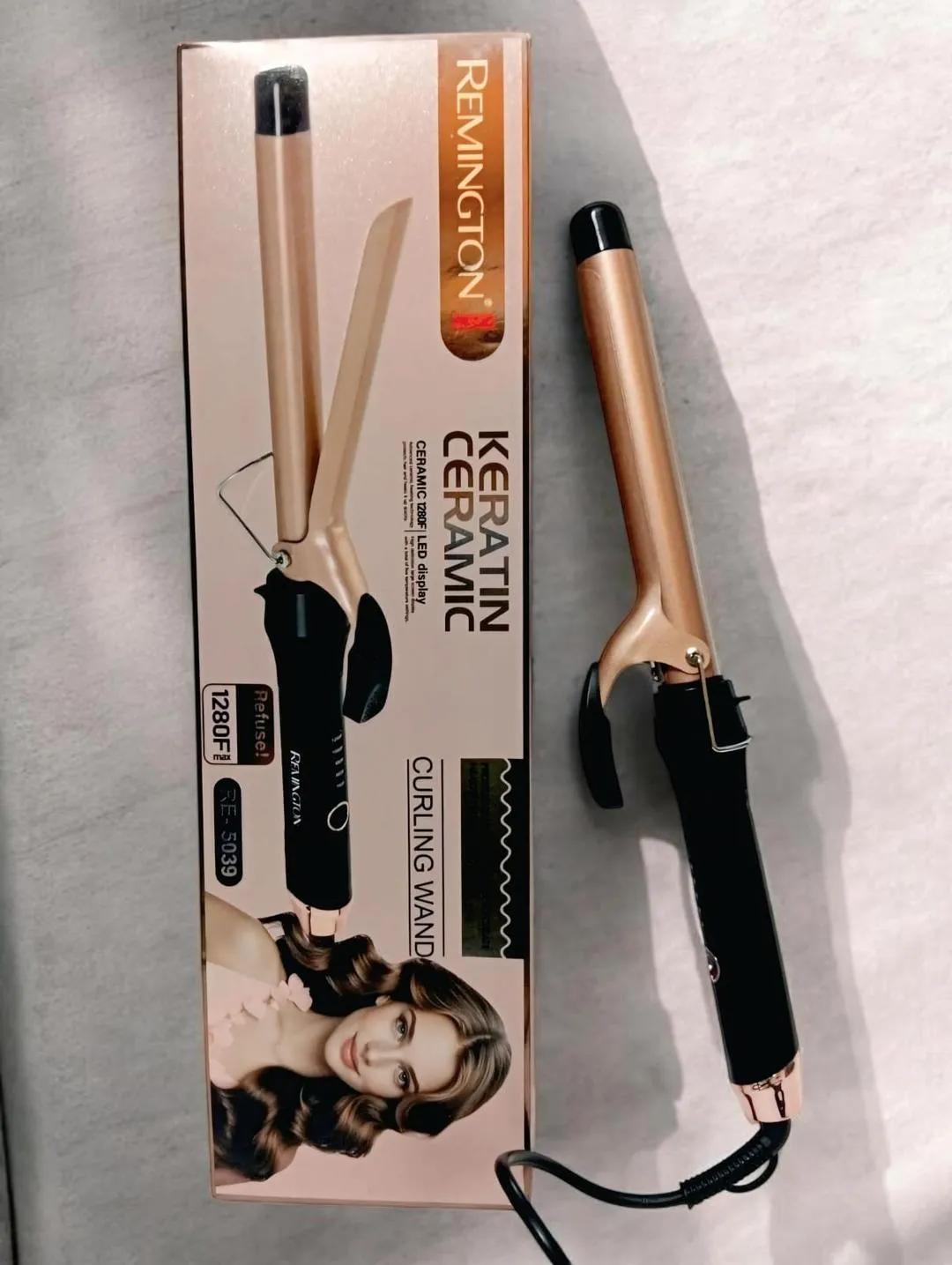 2129-404-712766-product-1 Remington Keratin Ceramic Curling Wand Rose Gold Black - Image 1
