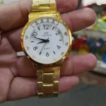 AW Gold Tone Quartz Watch with Heart Bezel