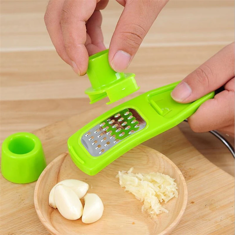 4-convert.io_-3.png Garlic Press Grater Slicer Plastic Grinding Tool Kitchen Accessories(random color ) - Image 1