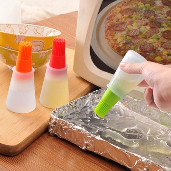 WhatsApp-Image-2024-07-19-at-11.43.27-AM.jpeg Portable Silicone Oil Bottle with Brush | Grill Oil Brushes for Kitchen Baking BBQ Tool Kitchen Tools for BBQ (Random color) - Image 1